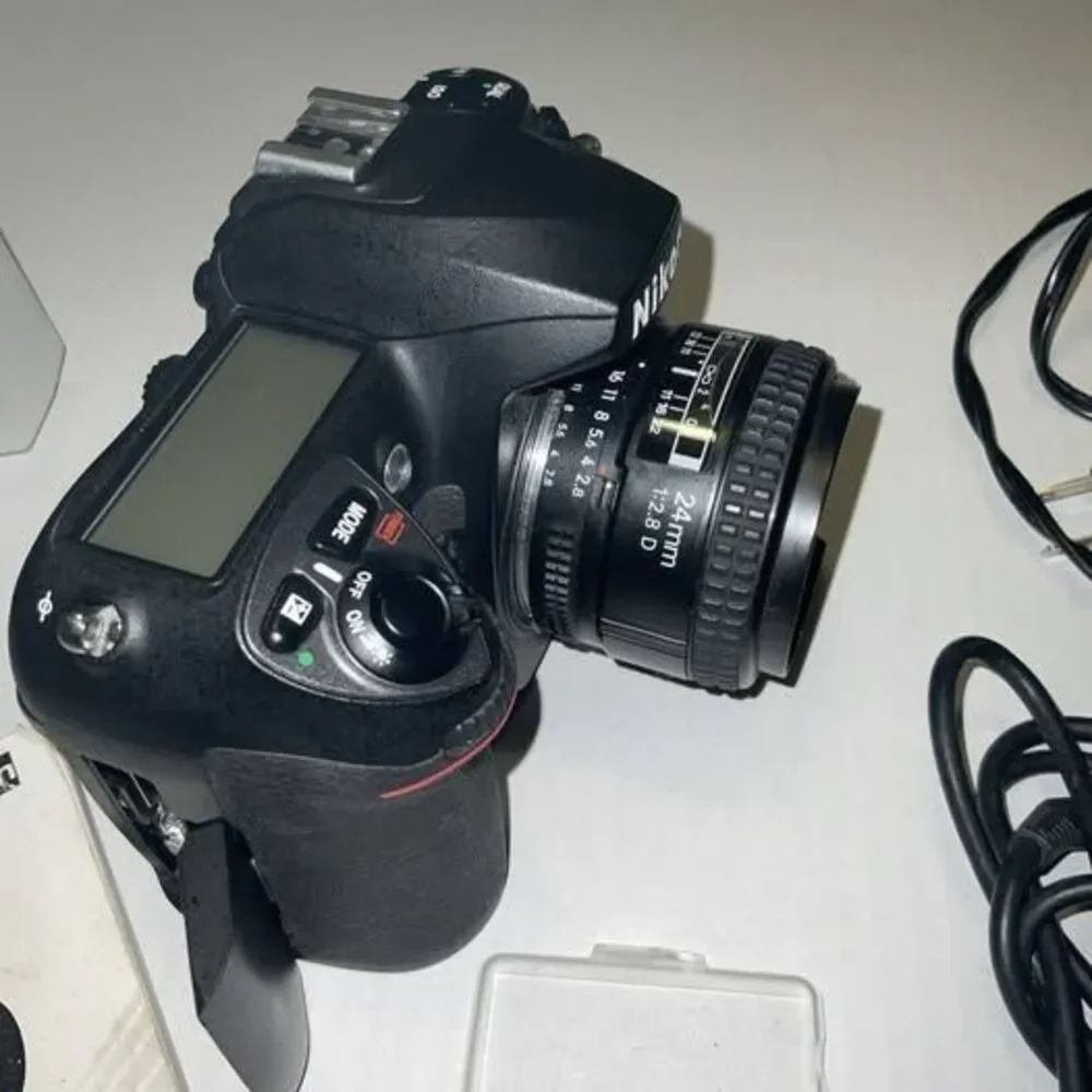 Nikon DS200 24 Mm Lens Plus Trigger 2 Batteries And Accessories
